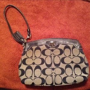 Navy blue authentic Coach wristlet