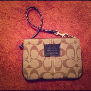 Black and Tan Coach wristlet