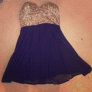 Black and gold cocktail dress.