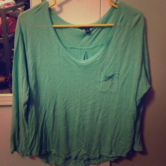 Long sleeved light blue top