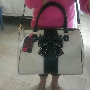Betsey Johnson weekender bag.