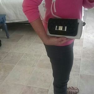 Betsey Johnson wallet with shoulder strap.