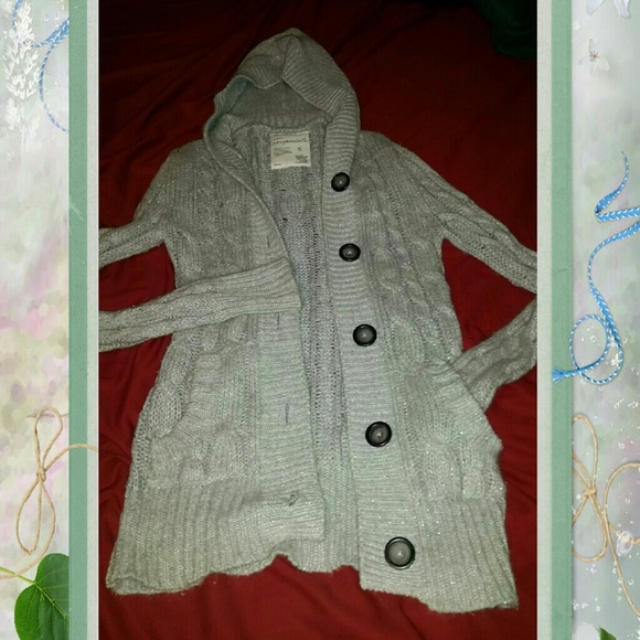 Silver grey sweater.