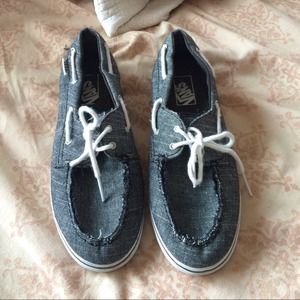 gray and white vans looks like sperrys