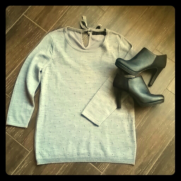 Classy sweater with mini pearls attached. Size XS