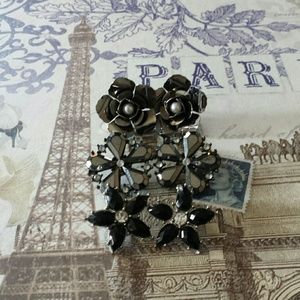 3 pairs of black floral earrings