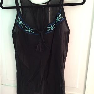 Black tank top with blue embroidery