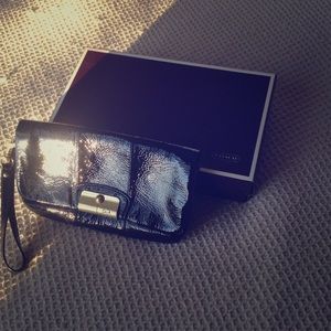 Black patent leather Coach clutch