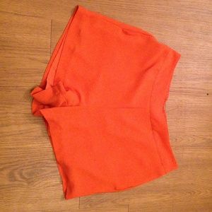 High waisted orange shorts