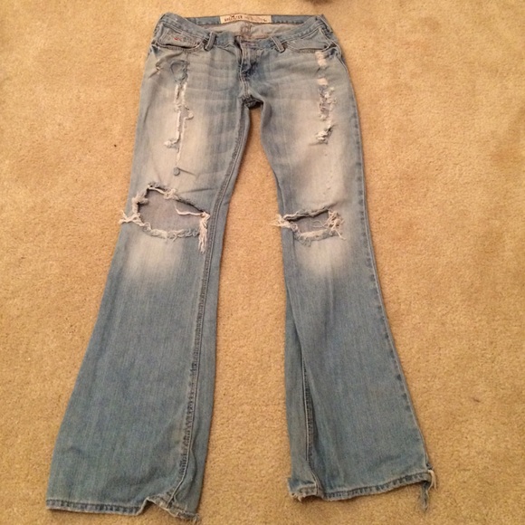 Light blue jeans with worn holes - Picture 1 of 2
