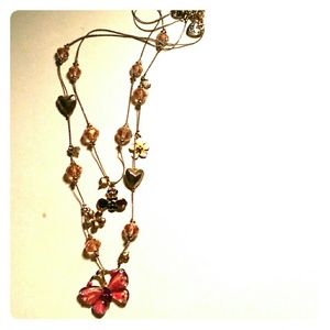 Betsey Johnson pink butterfly layer necklace.