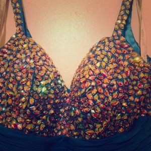 Jeweled aqua blue gown eloquently designed PROM