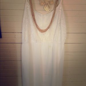 Long white dress.
