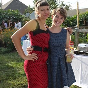 Fitted black and red polka dot dress