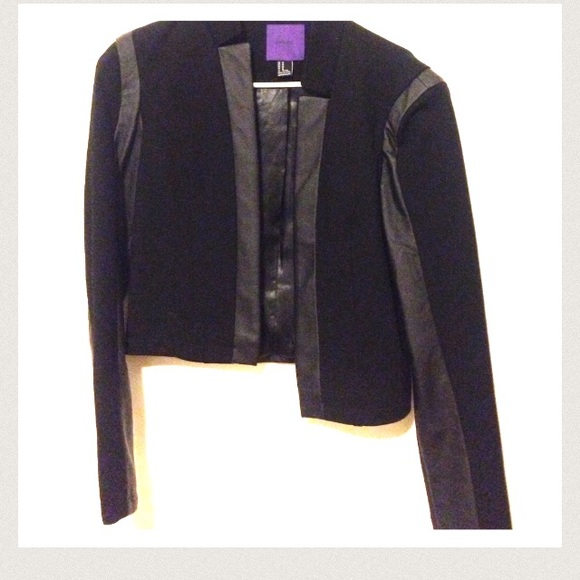 Leather jacket with fancy grey shirt.
