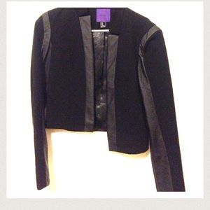 Leather jacket with fancy grey shirt.