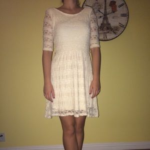 Cream color lace dress.