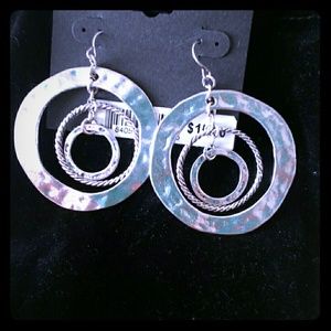 Silver tone hanging earings.