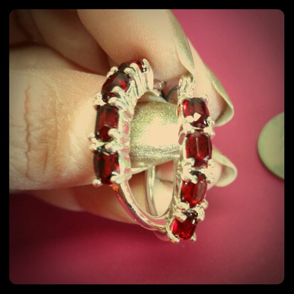 Hoop earrings with pretty garnet colored stones