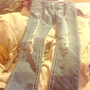 New, never worn light blue jeans.