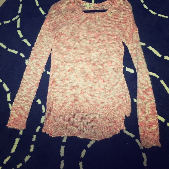 Pink and white knitted sweater