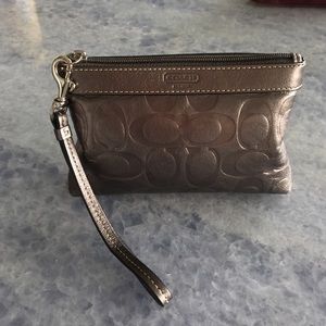 Metallic gray coach wristlet Metallic gray coach wristlet