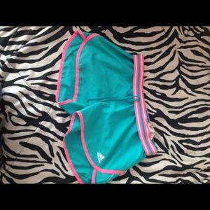 Light blue and pink adidas shorts