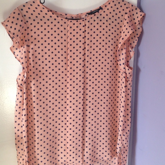 Silk peach with blue polka dot shirt.