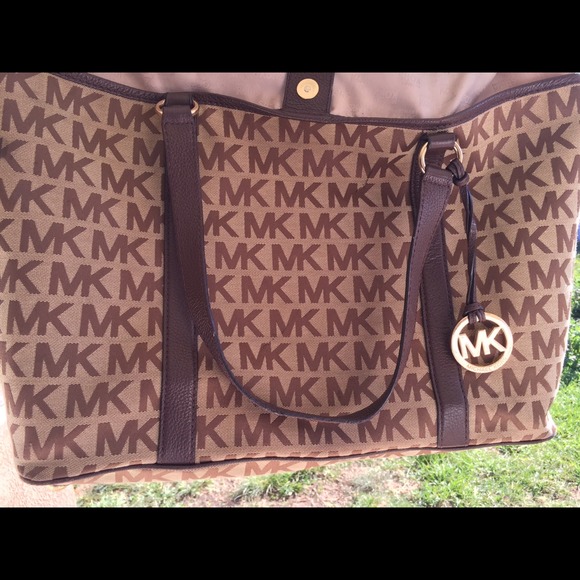 Michael Kors large monogram shopper.