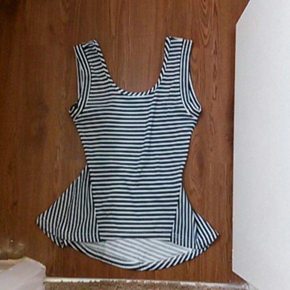 Roommates stripped slight peplum style shirt