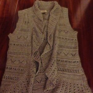 Grey and white sleeveless sweater