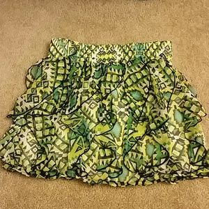 Green, yellow and black ruffly skirt