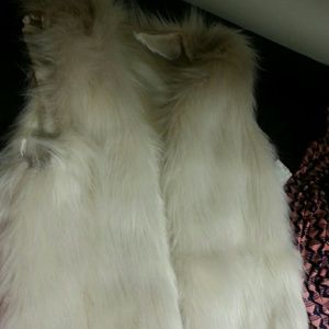 White fur vest