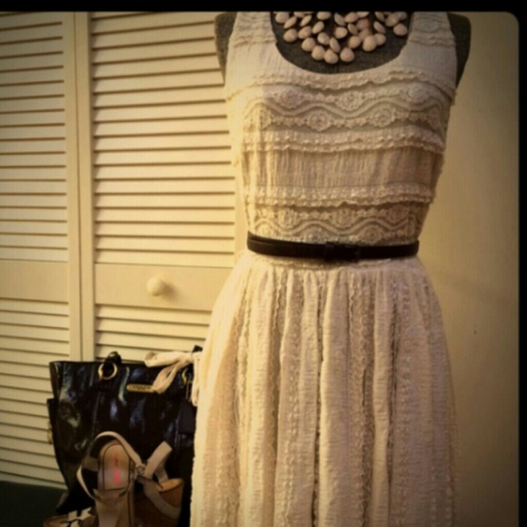 Cream lace dress. I'm 5' 3" and it is to my knees.