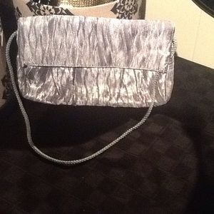 Silver satin clutch