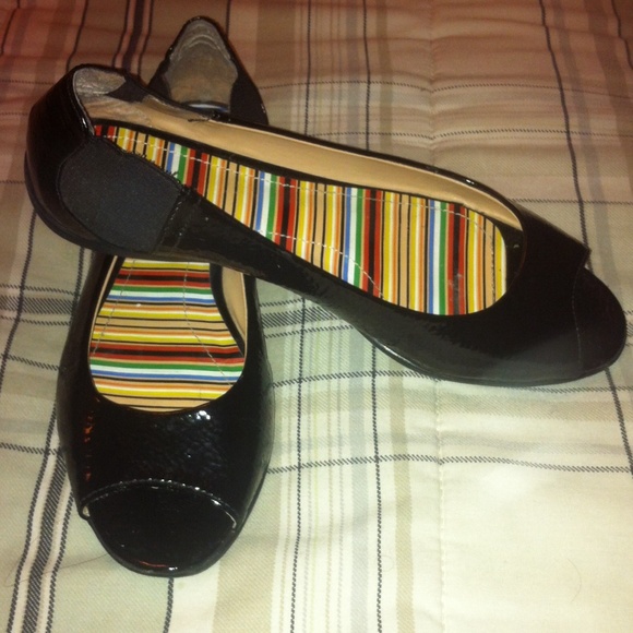 Black peep toe ballet flats .