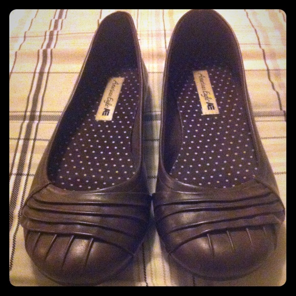 Chocolate brown ballet flats.