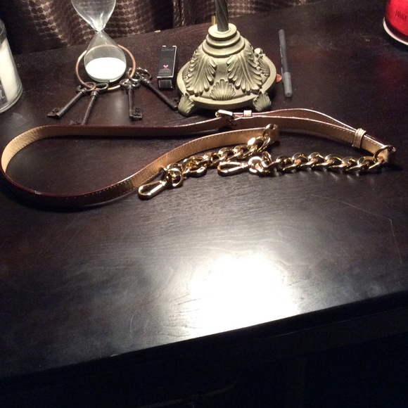 A Mk leather purse strap