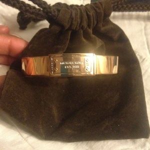 Women's rose gold-tone logo plaque bangle bracelet