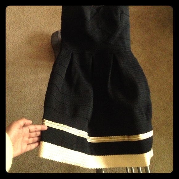 Black textured party dress with gold trim