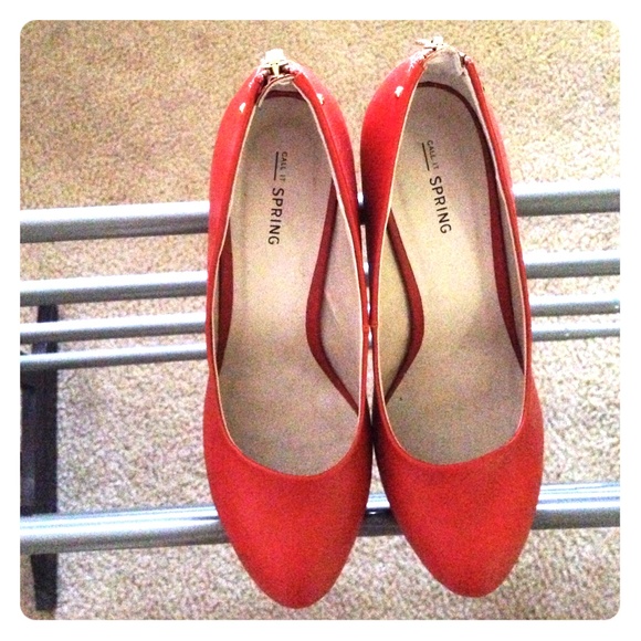 Orange zip back high heels, worn once, fits size 8