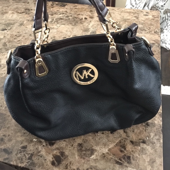 Black with brown handles MK handbag