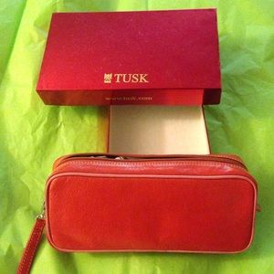 Tusk cosmetic clutch