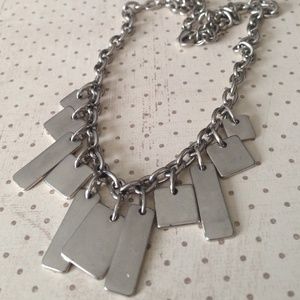 Silver necklace with square shaped dangles