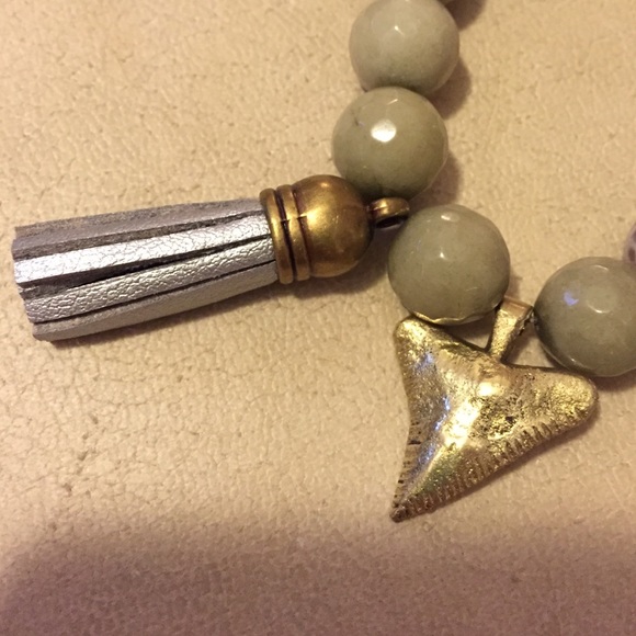 Polished stone bracelet with leather tassel - Picture 2 of 4