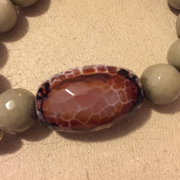 Polished stone bracelet with leather tassel - Picture 4 of 4