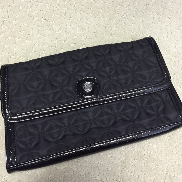 Black quilted and patent leather clutch