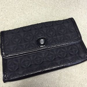 Black quilted and patent leather clutch