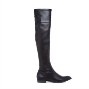 Knee high slim fitting black boots
