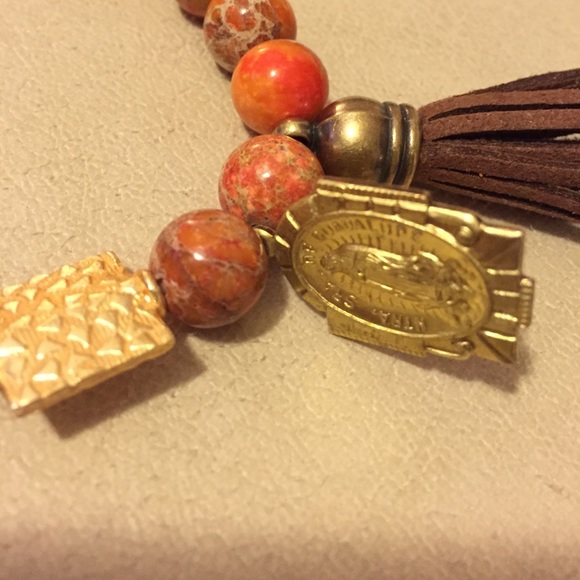 Polished stone bracelet with leather tassel saint - Picture 2 of 3